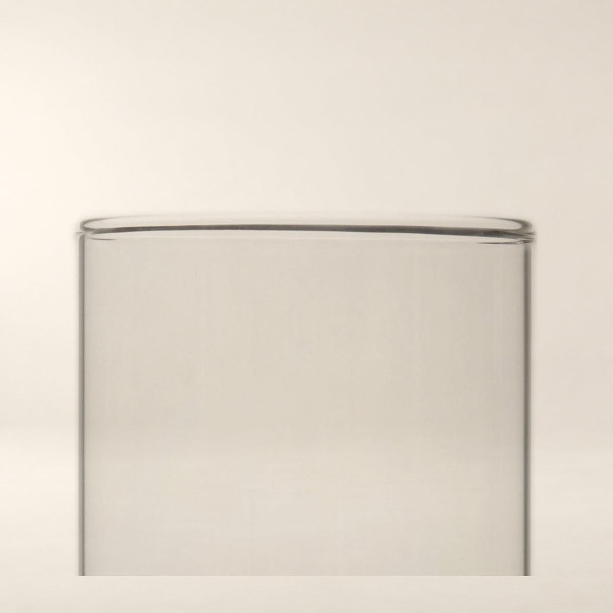 Sora Handblown Glass Cylinder Vase, 7 in tighter close-up of the photographed surface.