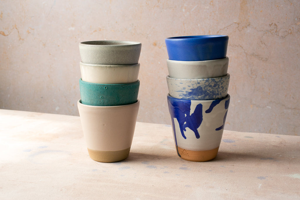 Short Hand-Thrown Stoneware Tumbler Cup styled on a wood table with linen in a modern Southwest room